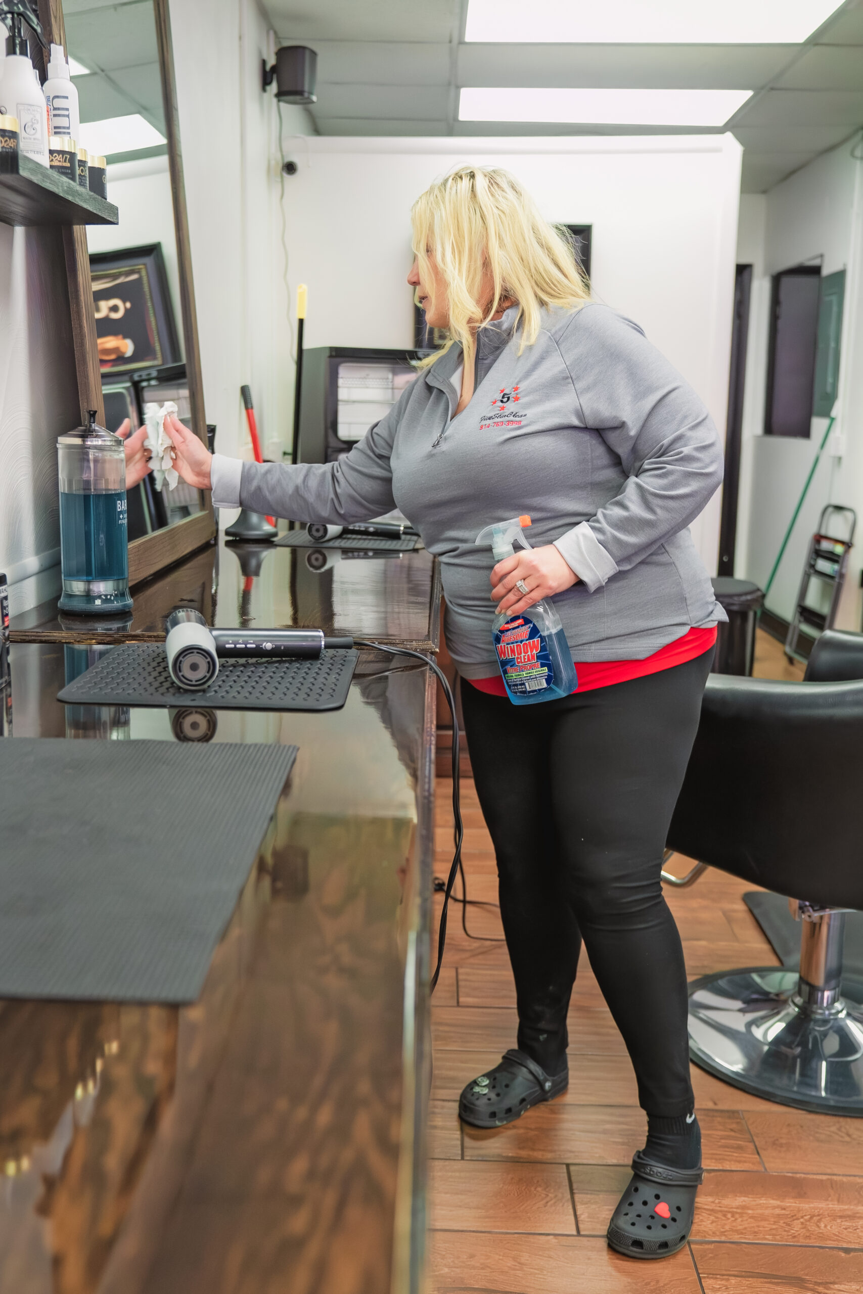 women cleaning a makeup table